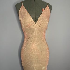 Low v-neck and backless shimmer pink dress